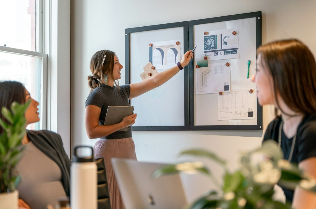 professional woman presenting in meeting