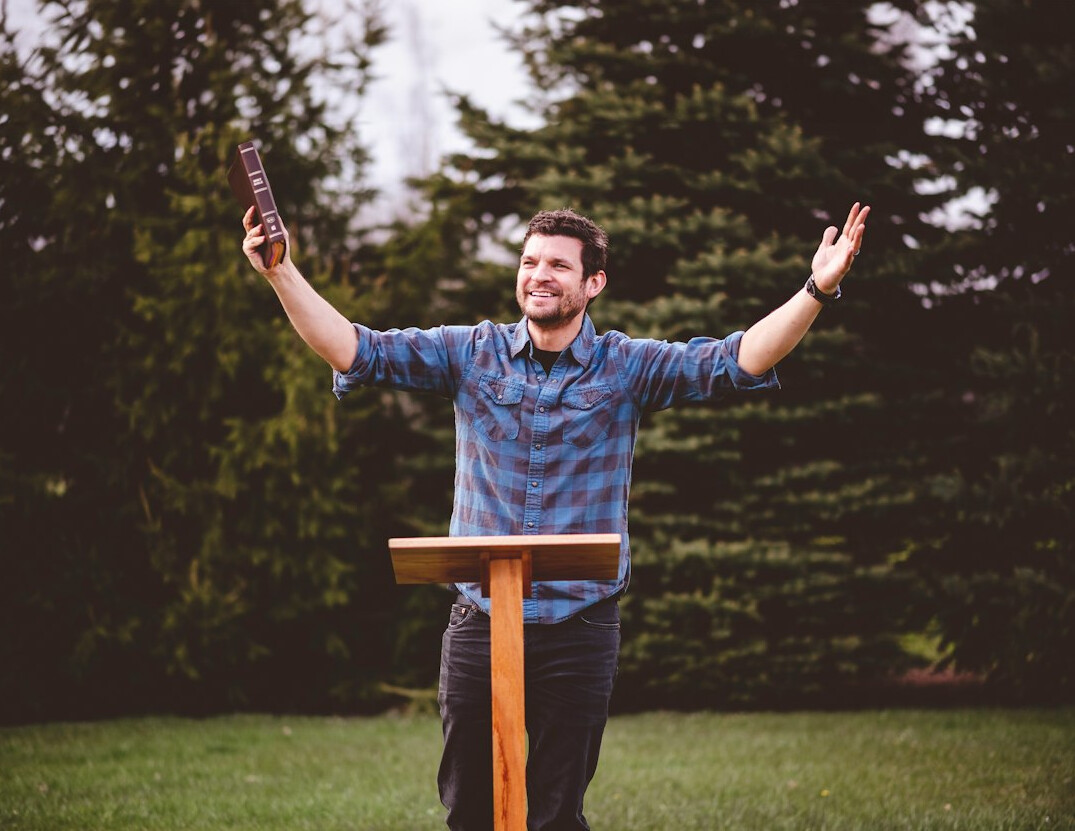 person speaking confidently at podium